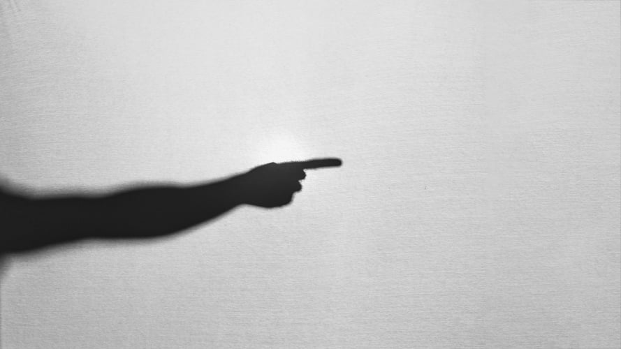 silhouette-hand-pointing-aside